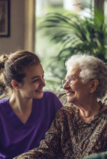 nurse in purple scrubs